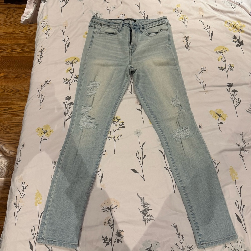 Light blue ripped skinny jeans in size 26